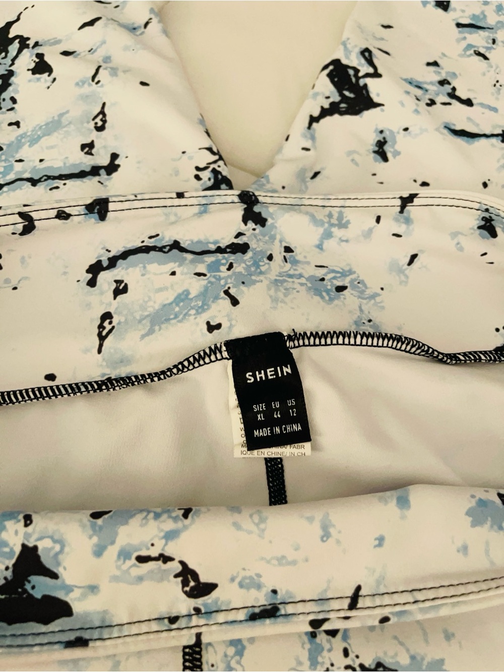 SHEIN White Sports Bra with Blue and Black Marble Print